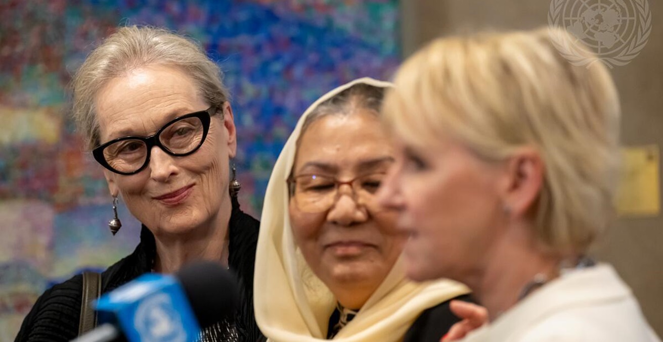 Meryl Streep (left), actor, and Habiba Sarabi (centre), former Minister for
 Women's Affairs of Afghanistan, watch as Margot Wallström, former Swedish Foreign Minister,
 addresses reporters following the 